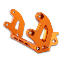 Load image into Gallery viewer, Surron Bike Upgrades Bundle - Orange - 20mm Lowering Peg Brackets, Ignition Key Plate, Shark Fin Disc Guard and Standard Adjustable Kickstand.
