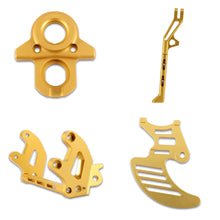 Load image into Gallery viewer, Surron Bike Upgrades Bundle - Gold - 20mm Lowering Peg Brackets, Ignition Key Plate, Shark Fin Disc Guard and Standard Adjustable Kickstand.
